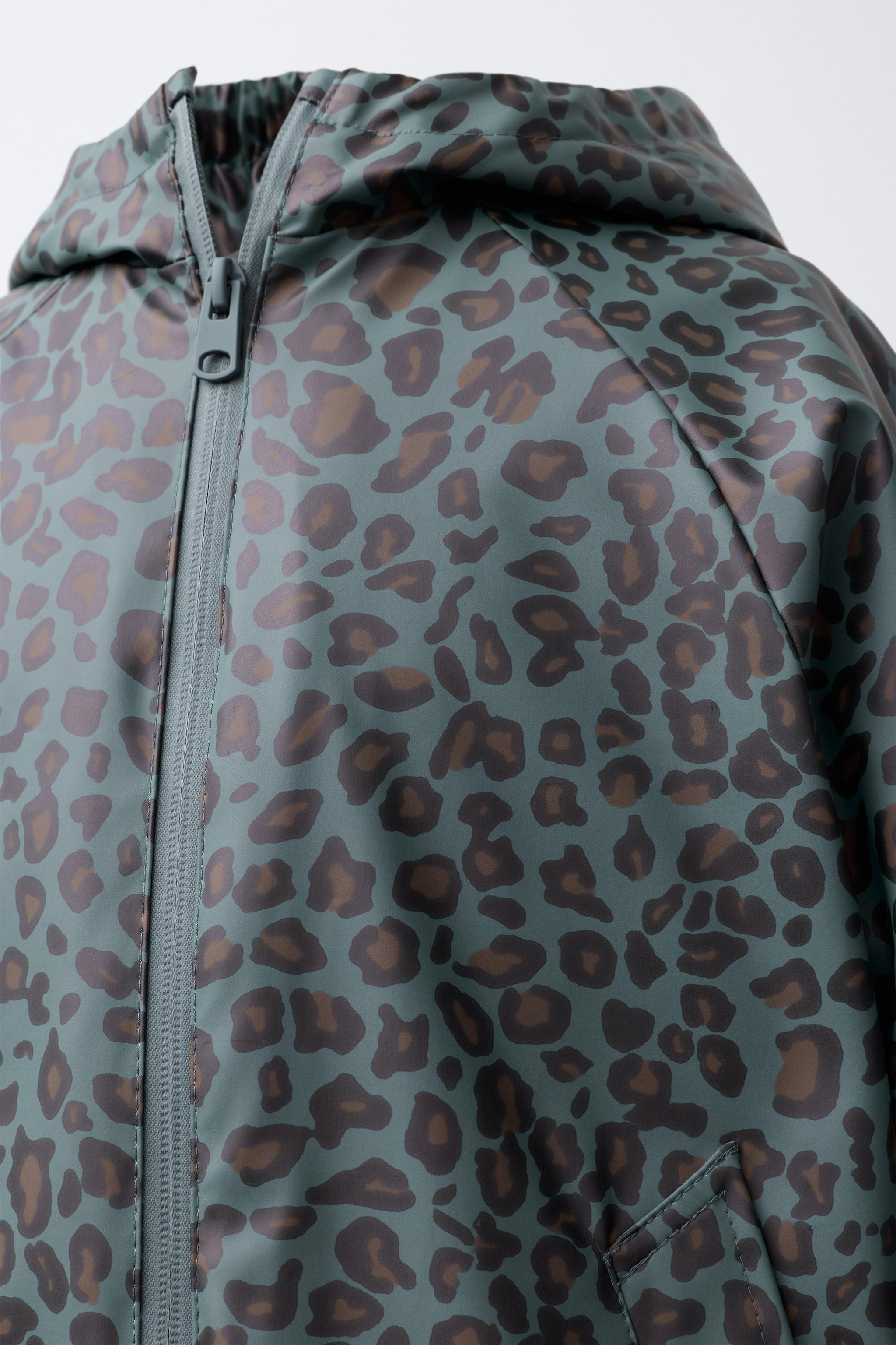 ANIMAL PRINT RUBBERIZED WATER-RESISTANT RAINCOAT WITH FLEECE LINING